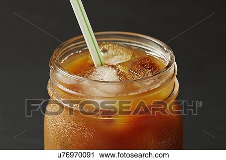 Stock Image - Ice coffee in jar. Fotosearch