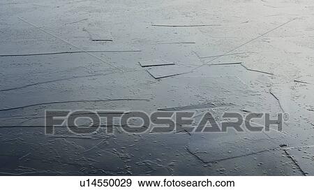 Stock Photo - Ice sheets on water. Fotosearch