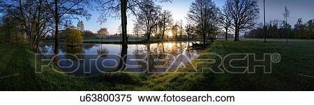 Stock Photography - Lake in park at sunrise. Fotosearch