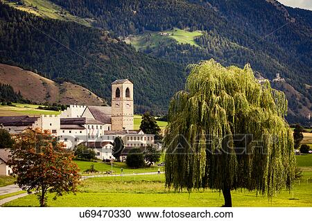 Landscape view of mountain and church, Mustair, Graubunden, Switzerland View Large Photo Image Stock Image - Landscape view of mountain and church, Mustair, Graubunden, Switzerland. Fotosearch