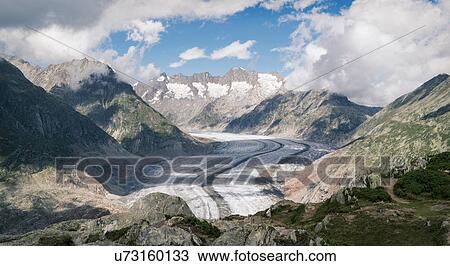 Stock Image - Landscape view of mountains and Aletsch Glacier, Canton Wallis, Switzerland. Fotosearch