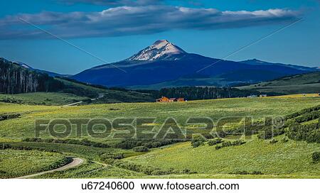 Log Cabin with Mountains and green trees - San Juan Mountains, Colorado, USA View Large Photo Image Stock Image - Log Cabin with Mountains and green trees - San Juan Mountains, Colorado, USA. Fotosearch