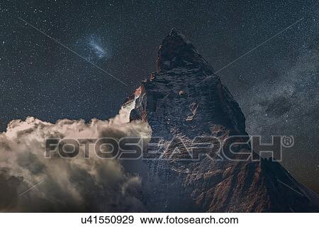 Low cloud at Matterhorn under starry night sky, Zermatt, Canton Wallis, Switzerland View Large Photo Image Stock Photo - Low cloud at Matterhorn under starry night sky, Zermatt, Canton Wallis, Switzerland. Fotosearch