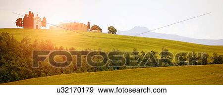 Stock Photo - Lush green landscape, Val d'Orcia, Siena, Tuscany, Italy. Fotosearch