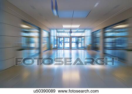 Stock Photo - Modern building interior, blurred. Fotosearch