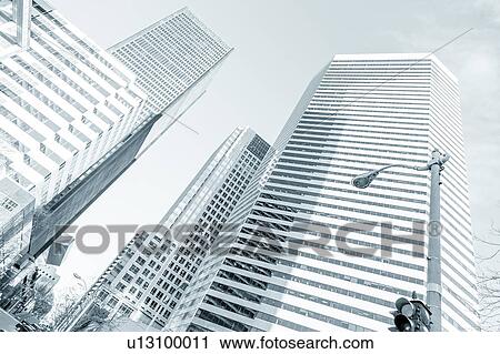 Stock Image - Modern skyscrapers, low angle view. Fotosearch