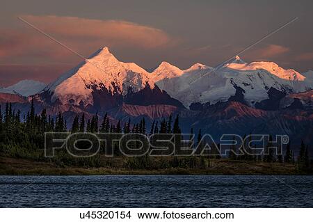 Mount Denali, previously known as McKinley from Wonder Lake, Denali National Park, Alaska View Large Photo Image Picture - Mount Denali, previously known as McKinley from Wonder Lake, Denali National Park, Alaska. Fotosearch