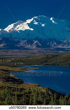 Mount Denali, previously known as McKinley from Wonder Lake, Denali National Park, Alaska View Large Photo Image Stock Photo - Mount Denali, previously known as McKinley from Wonder Lake, Denali National Park, Alaska. Fotosearch