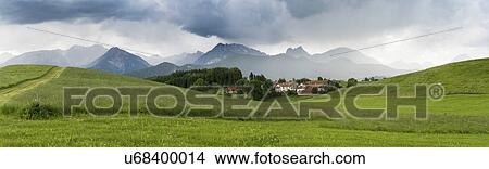 Picture - Mountains and green fields, Germany. Fotosearch