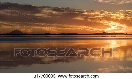 Stock Image - Mt Redoubt Volcano at Skilak Lake, Alaska, the Aleutian Mountain Range. Fotosearch