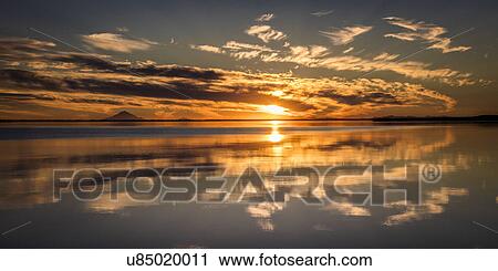 Stock Image - Mt Redoubt Volcano at Skilak Lake, Alaska, the Aleutian Mountain Range. Fotosearch