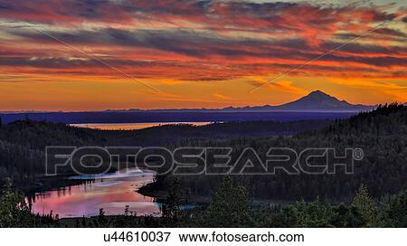 Stock Photo - Mt Redoubt Volcano at Skilak Lake, Alaska, the Aleutian Mountain Range. Fotosearch