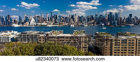 Stock Image - New York CIty Skyline as seen from Pallisades Avenue, New Jersey. Fotosearch