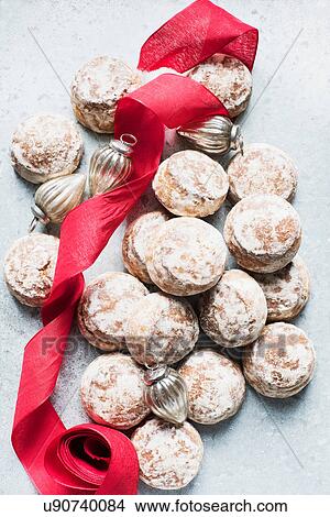 Overhead view of Christmas baubles, red ribbon with fresh scones View Large Photo Image Picture - Overhead view of Christmas baubles, red ribbon with fresh scones. Fotosearch