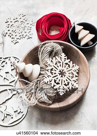 Picture - Overhead view of Christmas decorations, red ribbon and string. Fotosearch