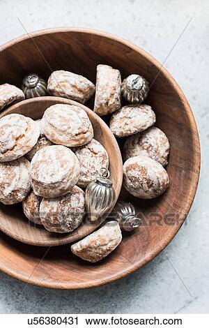 Overhead view of silver Christmas baubles and fresh scones in bowls View Large Photo Image Stock Image - Overhead view of silver Christmas baubles and fresh scones in bowls. Fotosearch