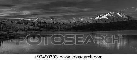 Stock Image - Panoramic view of Mount Denali, previously known as McKinley from Wonder Lake, Denali National Park, Alaska. Fotosearch