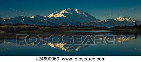 Stock Photo - Panoramic view of Mount Denali, previously known as McKinley from Wonder Lake, Denali National Park, Alaska. Fotosearch