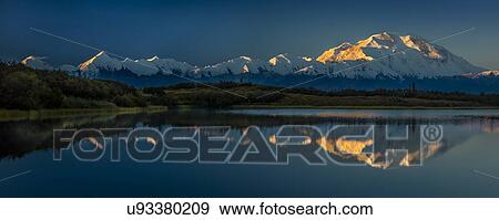 Stock Photo - Panoramic view of Mount Denali, previously known as McKinley from Wonder Lake, Denali National Park, Alaska. Fotosearch