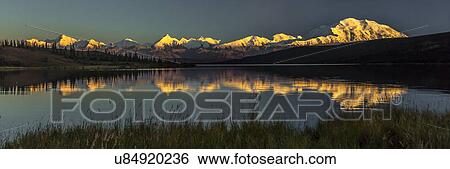 Stock Photograph - Panoramic view of Mount Denali, previously known as McKinley from Wonder Lake, Denali National Park, Alaska. Fotosearch