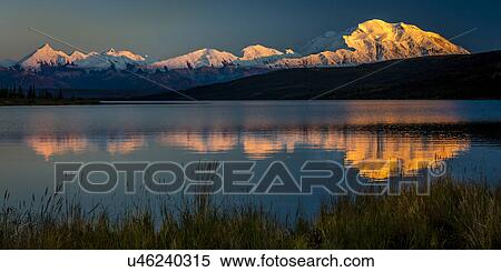Stock Photography - Panoramic view of Mount Denali, previously known as McKinley from Wonder Lake, Denali National Park, Alaska. Fotosearch