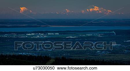Stock Image - Panoramic View Overlooking Anchorage Alaska at sunrise. Fotosearch