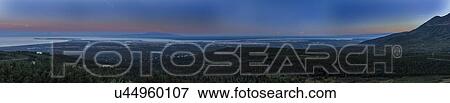 Stock Photo - Panoramic View Overlooking Anchorage Alaska at sunrise. Fotosearch