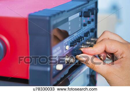 Person turning a dial on a telephone receiver View Large Photo Image Stock Image - Person turning a dial on a telephone receiver. Fotosearch