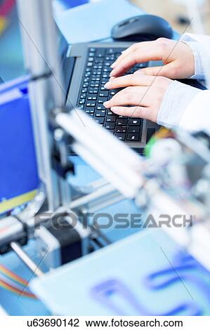Person using computer View Large Photo Image Stock Image - Person using computer. Fotosearch