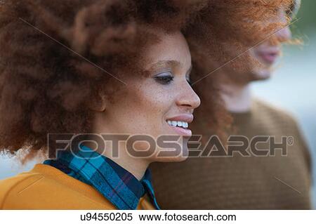 Stock Photography - Portrait of loving multi-ethnic couple. Fotosearch