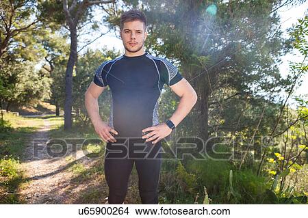 Portrait of male runner in coastal park, Split, Dalmatia, Croatia View Large Photo Image Picture - Portrait of male runner in coastal park, Split, Dalmatia, Croatia. Fotosearch