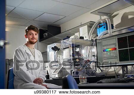 Stock Photo - Portrait of scientist in laboratory looking at camera. Fotosearch