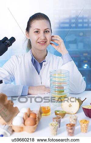 Portrait of woman in food quality control laboratory View Large Photo Image Stock Photo - Portrait of woman in food quality control laboratory. Fotosearch