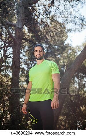 Portrait of young male runner in park, Split, Dalmatia, Croatia View Large Photo Image Picture - Portrait of young male runner in park, Split, Dalmatia, Croatia. Fotosearch