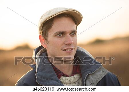 Portrait of young man in rural setting View Large Photo Image Stock Photo - Portrait of young man in rural setting. Fotosearch