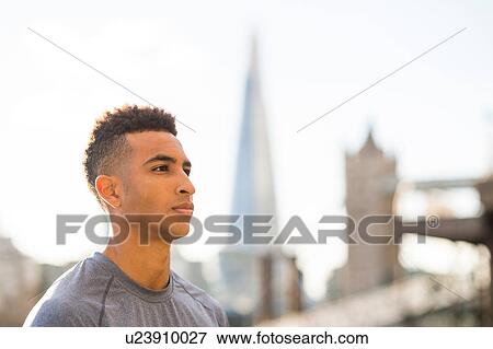 Stock Photo - Portrait of young man, Wapping, London, UK. Fotosearch