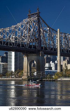 Stock Image - Queens Bridge to Roosevelt Island, New York, NY. Fotosearch