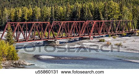 Red Rod Iron Railroad Bridge traverses Alaskan river, Alaska View Large Photo Image Stock Image - Red Rod Iron Railroad Bridge traverses Alaskan river, Alaska. Fotosearch