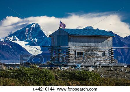 Picture - Remote Cabin along Denali Highway, Route 8, offers views of Mt. Deborah, Mnt. Hess Mountain, & Mt. Hayes Alaska, Alaska. Fotosearch