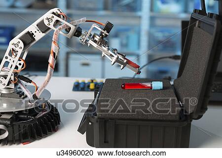 Stock Image - Robotic arm with test tube. Fotosearch