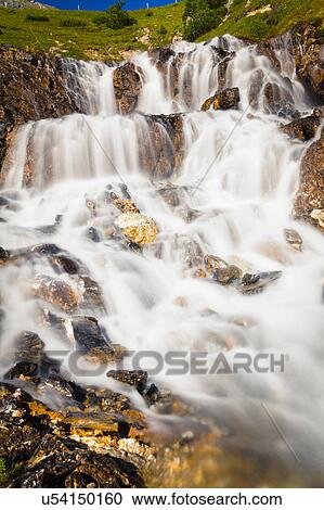 Stock Image - Rocky waterfall, Albula Pass, Graubunden, Switzerland. Fotosearch