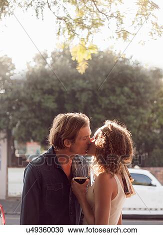 Romantic couple kissing on street, Cape Town, South Africa View Large Photo Image Stock Image - Romantic couple kissing on street, Cape Town, South Africa. Fotosearch
