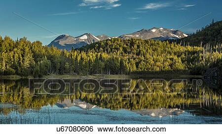 Scenic View Of The Kenai Mountains Reflected In Tern Lake During Fall On The Kenai Peninsula In Southcentral Alaska View Large Photo Image Stock Photograph - Scenic View Of The Kenai Mountains Reflected In Tern Lake During Fall On The Kenai Peninsula In Southcentral Alaska. Fotosearch