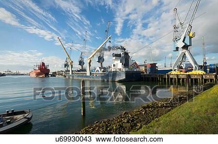 Stock Image - Ships moored at Waalhaven, Rotterdam harbour, Netherlands. Fotosearch