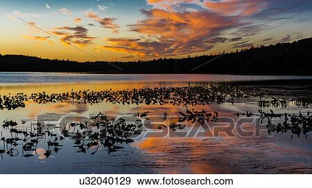 Stock Photo - Skilak Lake, Alaska, the Aleutian Mountain Range. Fotosearch