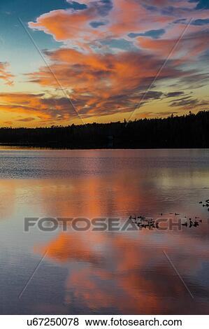 Stock Photo - Skilak Lake, Alaska, the Aleutian Mountain Range. Fotosearch