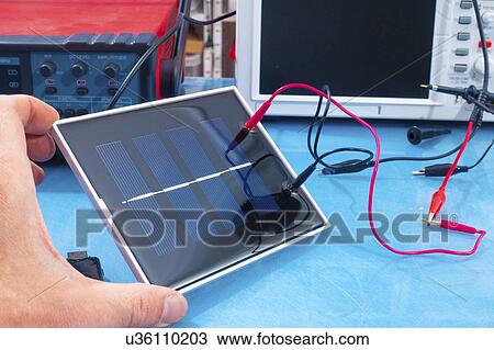 Stock Image - Solar cell research. Fotosearch