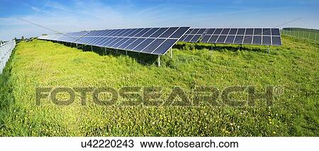 Stock Image - Solar panels in grass. Fotosearch