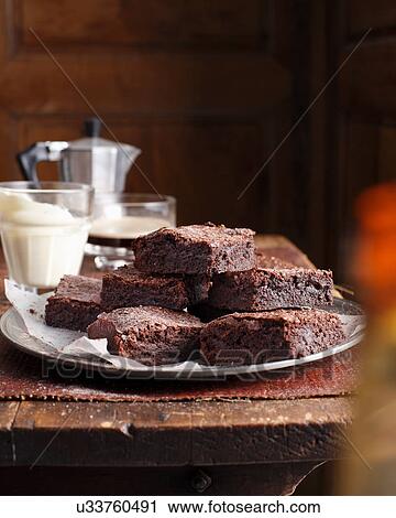 Stack of chocolate brownies on plate View Large Photo Image Stock Image - Stack of chocolate brownies on plate. Fotosearch