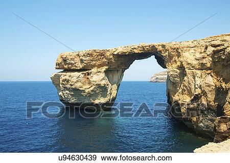 Stock Photo - Stone arch Gozo island. Fotosearch